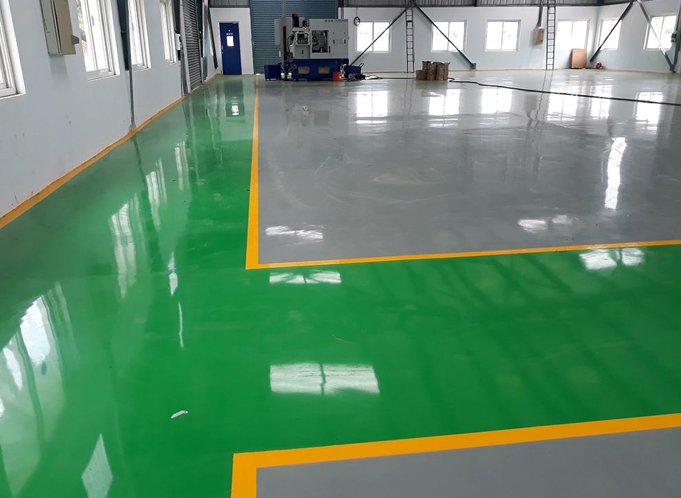 Sàn nhà xưởng lối xe nâng — khu vực dễ nhiễm dầu nhớt